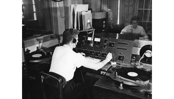 Student in control room, circa 1952. Photo from University Archives.