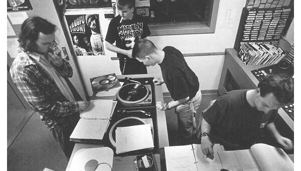 WKNC staff in studio. Photo from 1995 Agromeck.