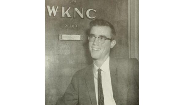General Manager Kent Weston in front of the WKNC offices on the third floor of the 1911 Building. Photo from 1960 Agromeck.