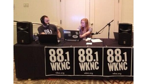 Program Director Michael D'Argenio and General Manager Bri Aab broadcast live from Wristband City during the 2013 Hopscotch Music Festival. WKNC has been a media sponsor of Hopscotch since its inception.