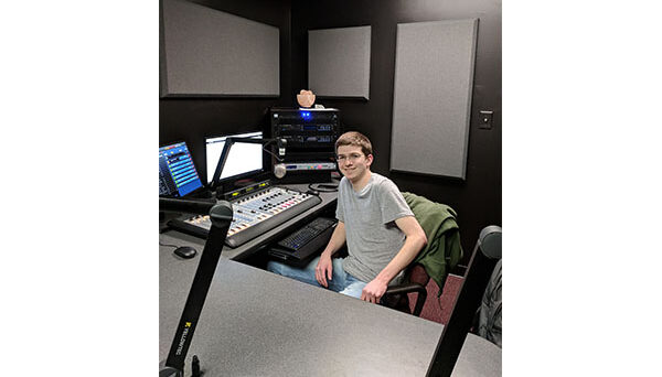 Jacob DeCicco hosts the first regular DJ shift in WKNC’s “Studio H.” Named for NC State student radio’s first general manager Harrison Wroton, the studio splits its time between a production studio and HD-2 air studio. Photo by Jamie Lynn Gilbert