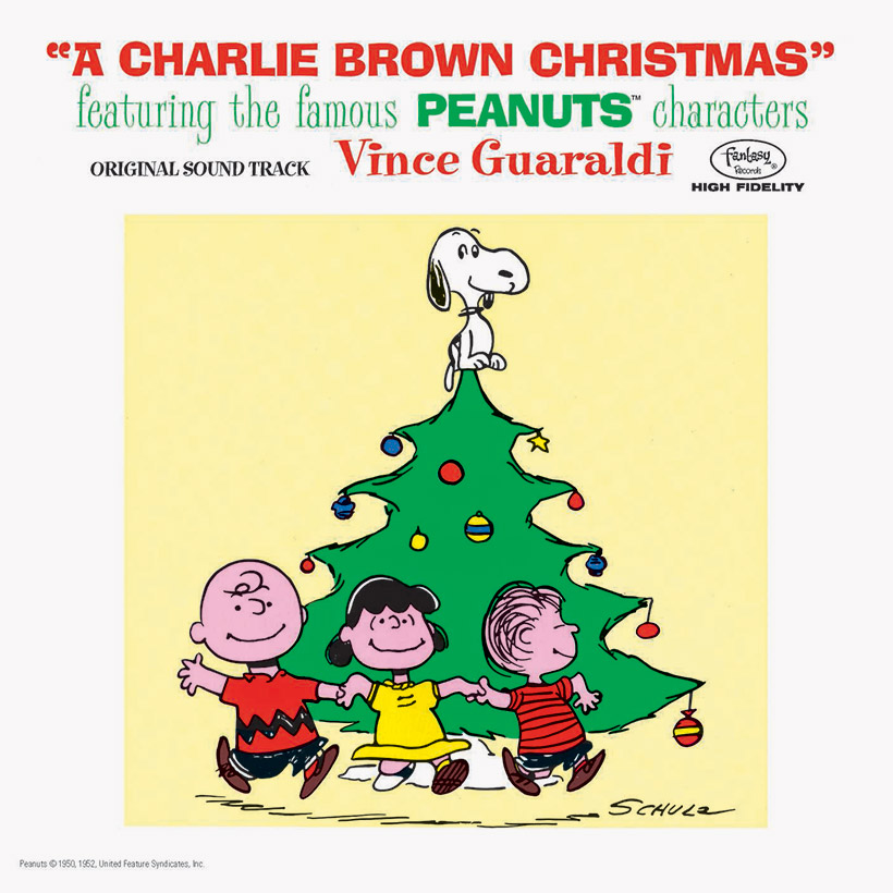 A Charlie Brown Christmas Soundtrack Cover with the Peanuts characters dancing around a Christmas tree