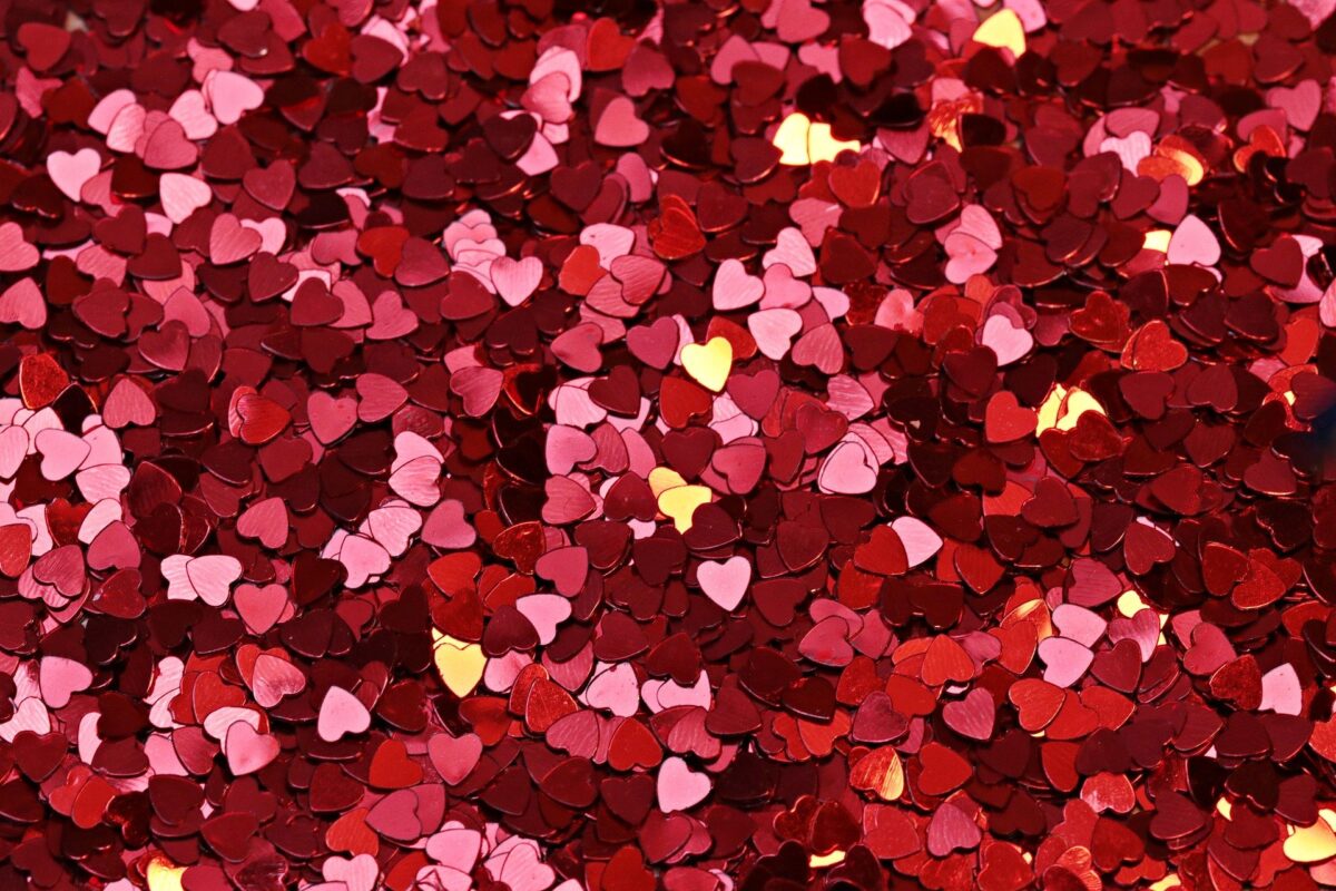 A pile of heart shaped pink glitter