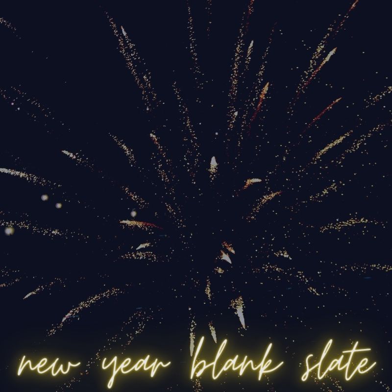 Black background with gold fireworks. Text on bottom of the image reads in yellow, glowing cursive "new year blank slate"