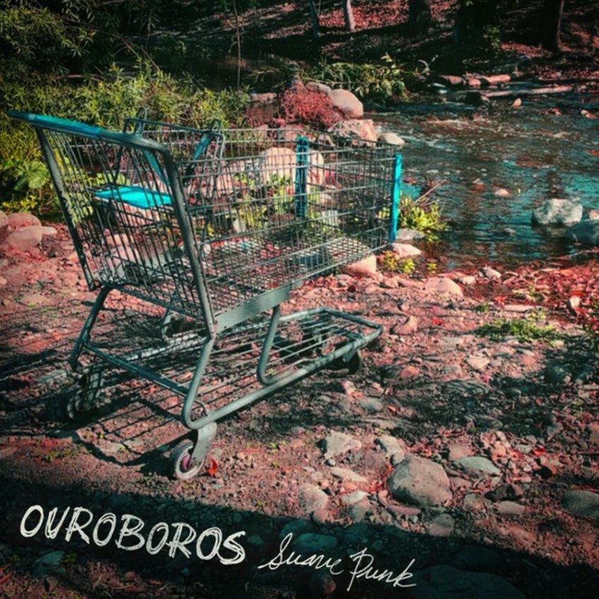 Abandoned shopping cart in the wilderness. Cover Art of "Ouroboros by Suave Punk