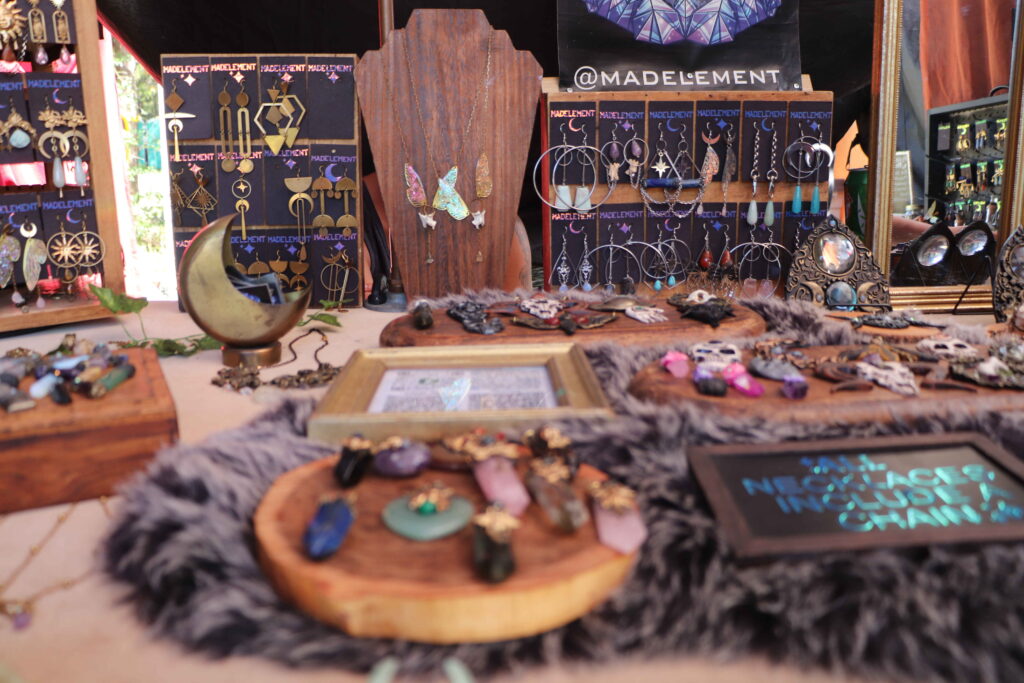 Mad element is pictured here. They are a vendor at Shakori that sells jewelry and crystals. 