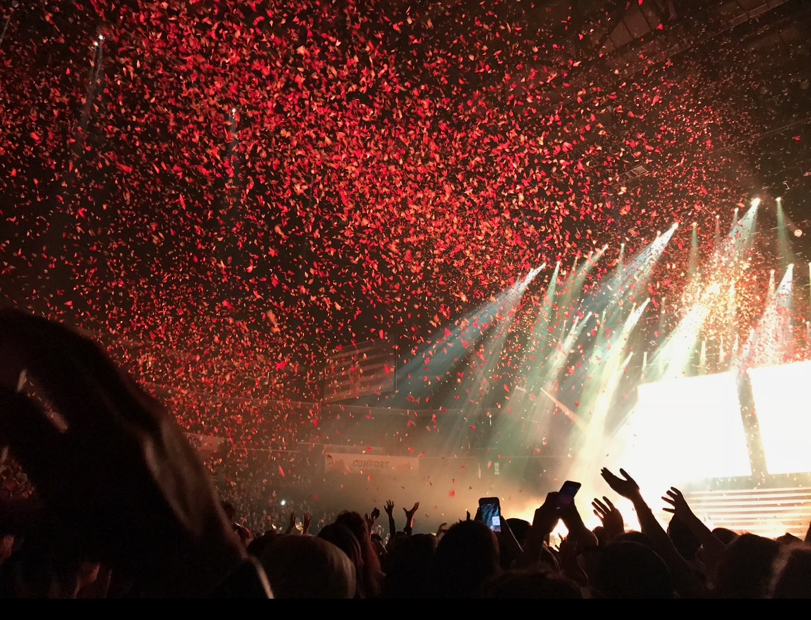 Concert Crowd with Yellow and Red Confetti