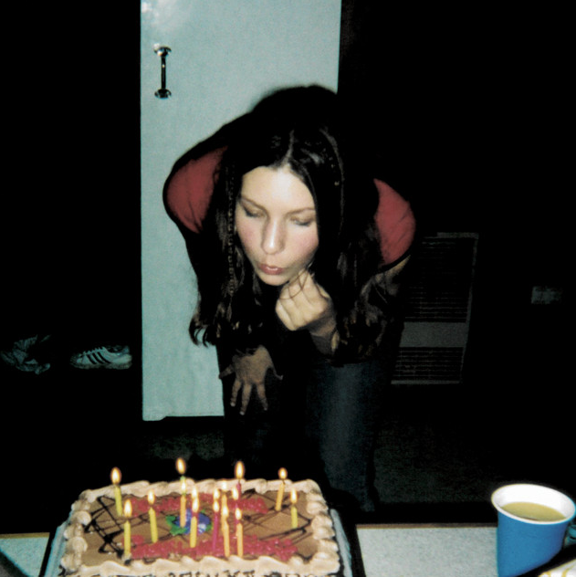 Verity Den self-titled album cover featuring a person leaning over to blow out candles on a birthday cake.