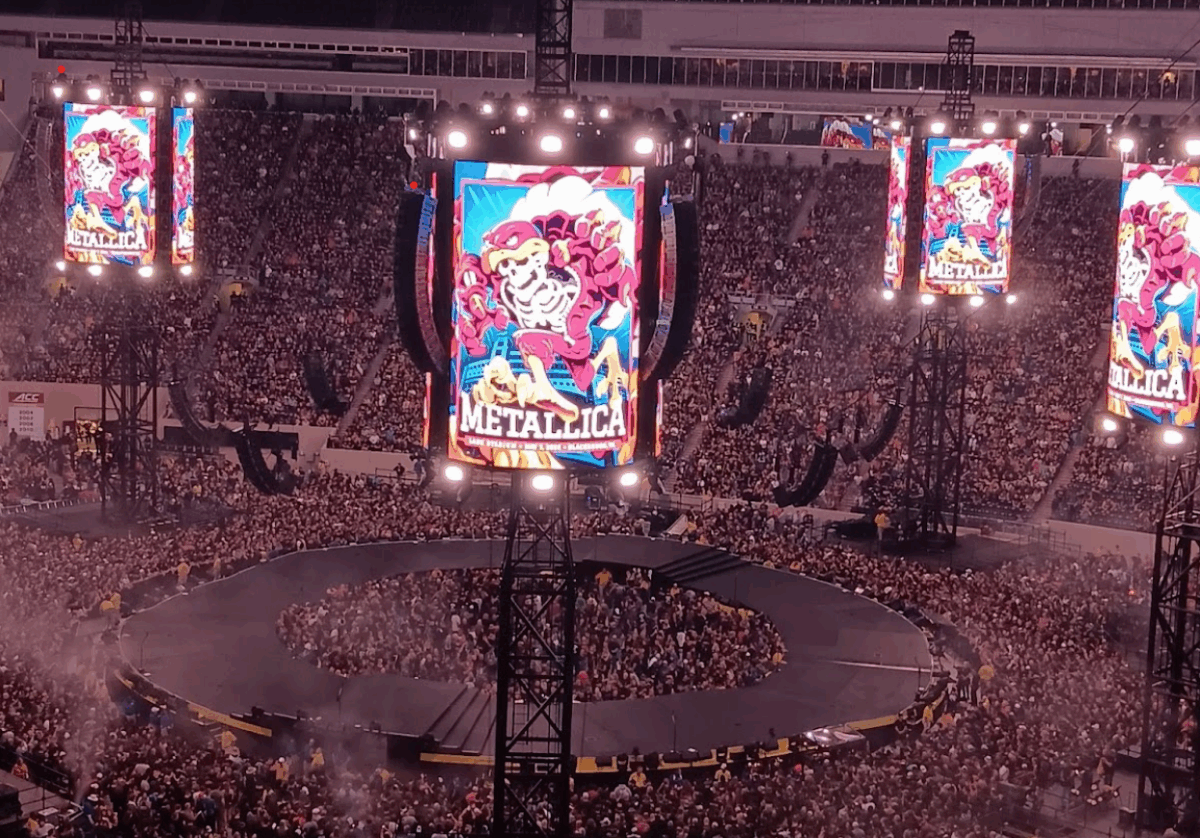 Lane Stadium with round stage and Jumbotrons indicating special Metallica at VT poster