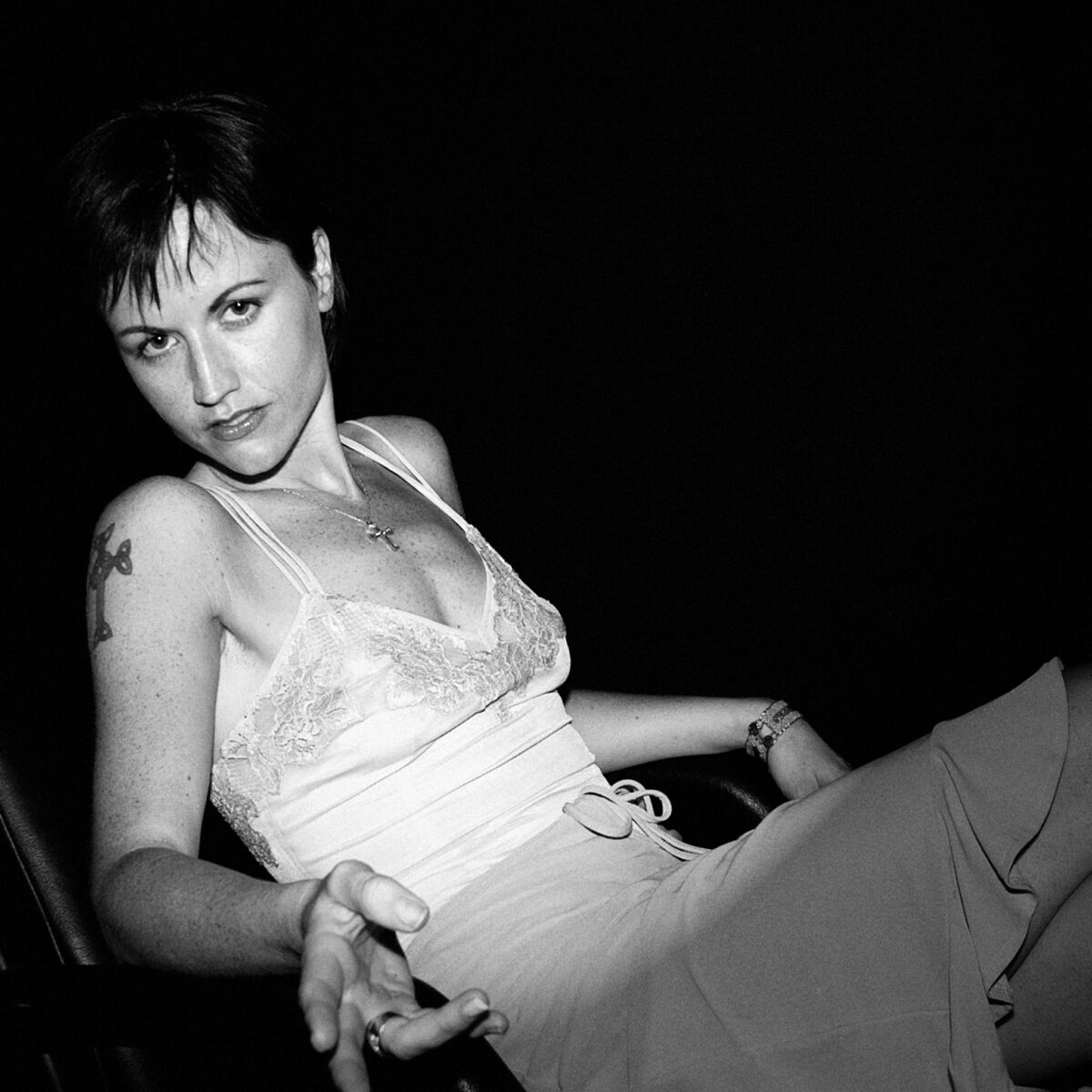 Woman with short hair reclining