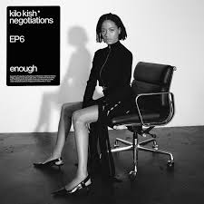 Kilo Kish sitting in leather office chair, looking at the camera.