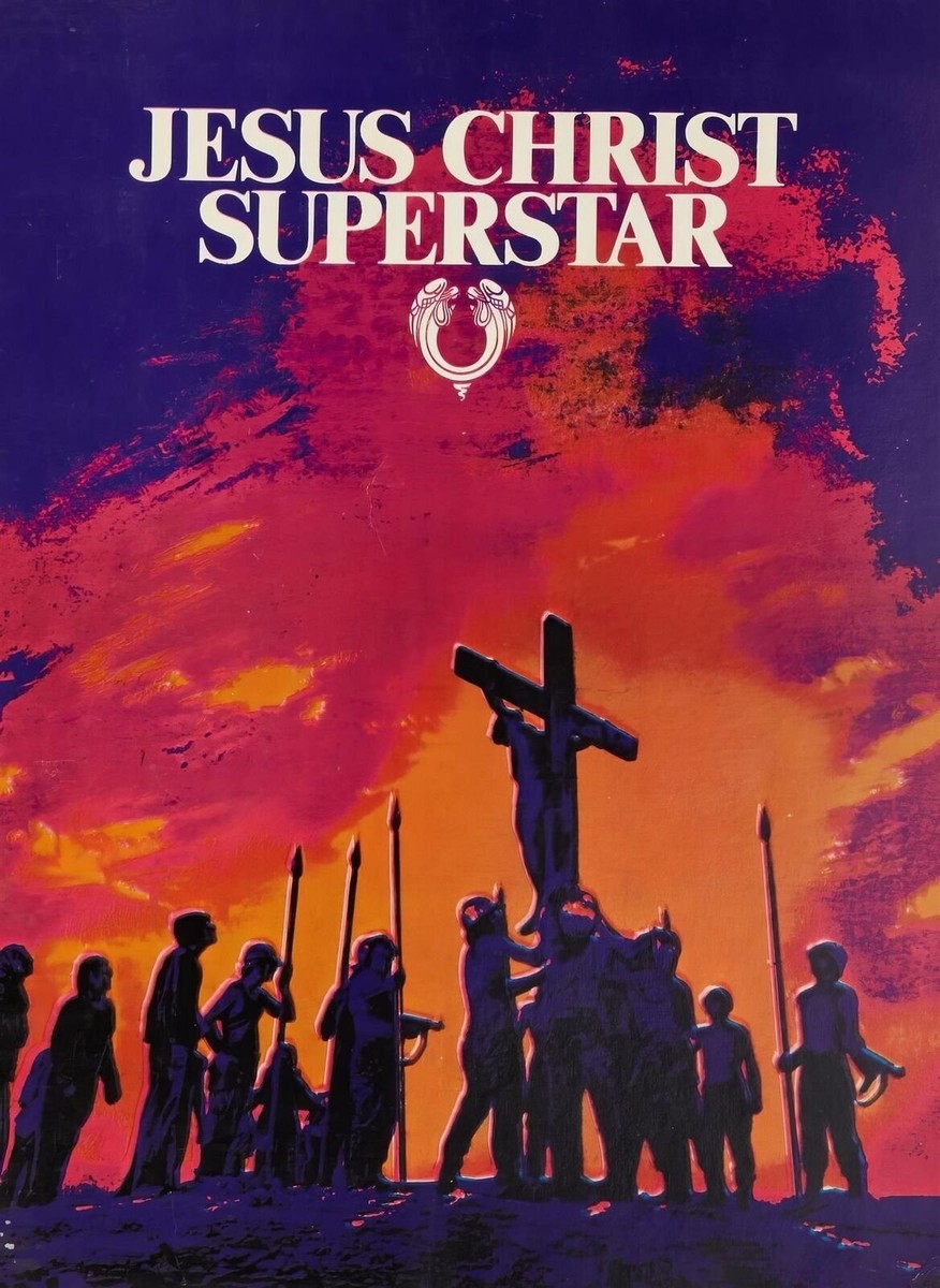 Jesus on the cross with red, orange, and purple background