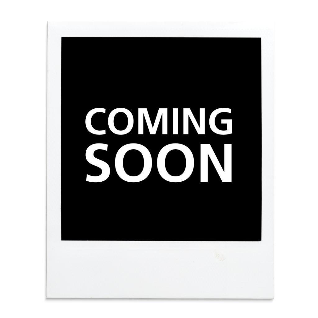 Polaroid with the word coming soon written in the picture area.