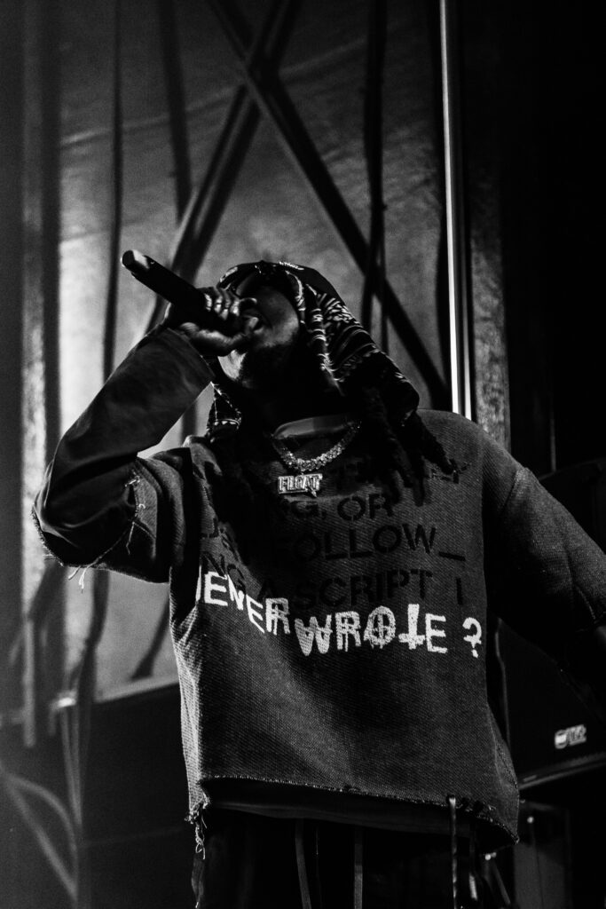 A black and white image of K CAMP.