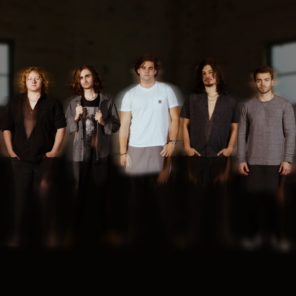 5 men pictured standing with an ethereal fuzzy filter