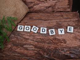 Scrabble letters arranged to say "Goodbye"